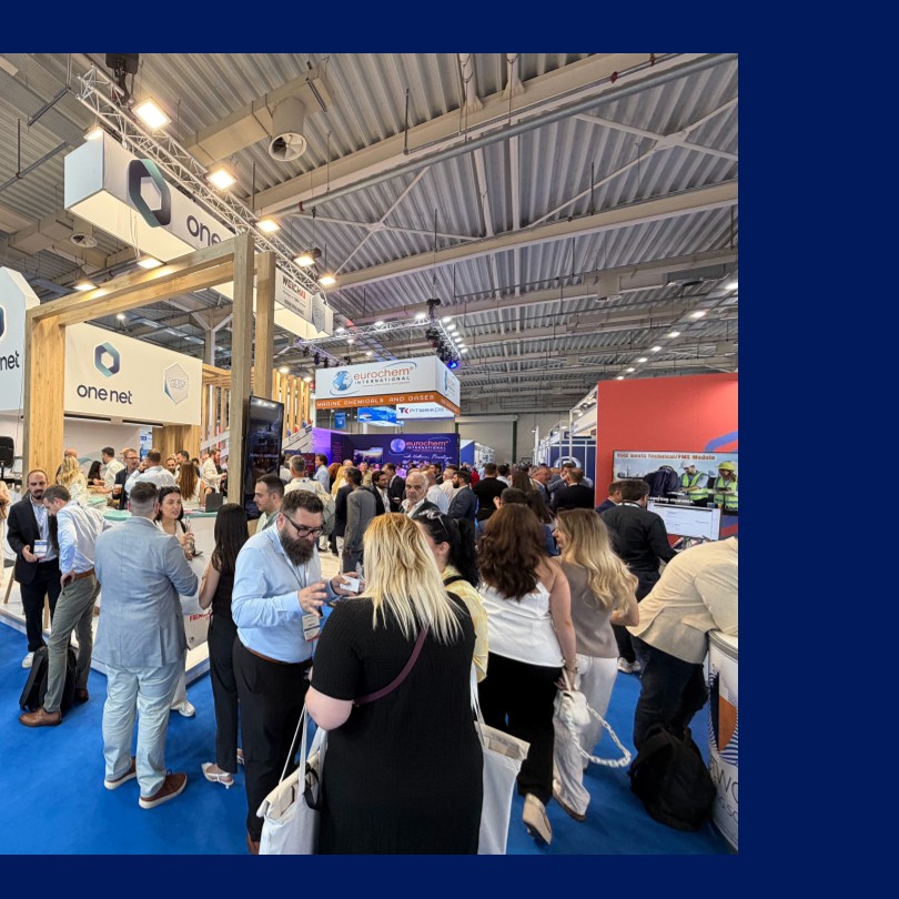 Conversations at the One Net stand at Posidonia 2026